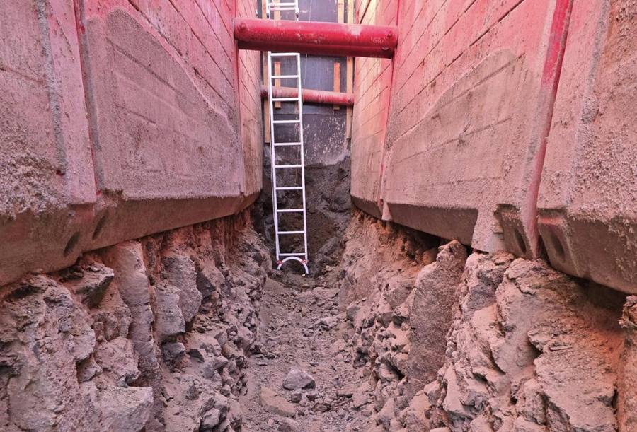 Deep shored trench excavation